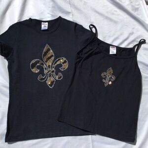 2 New Orleans Saints Shirts, 1 Spaghetti Strap, 1 Cap Sleeve T-Shirt, both LARGE